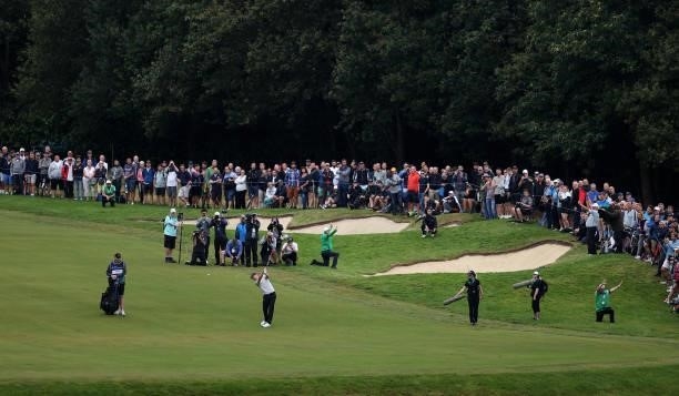 Justin Rose of England plays his second shot from the 18th fairway during Day Two of The BMW PGA Championship at Wentworth Golf Club on September 10,...