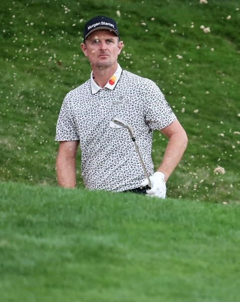 Justin Rose of England plays out of a bunker on the 18th hole during Day Two of The BMW PGA Championship at Wentworth Golf Club on September 10, 2021...