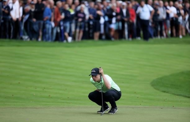 Matt Fitzpatrick of England lines up a putt on the 18th green during Day Two of The BMW PGA Championship at Wentworth Golf Club on September 10, 2021...