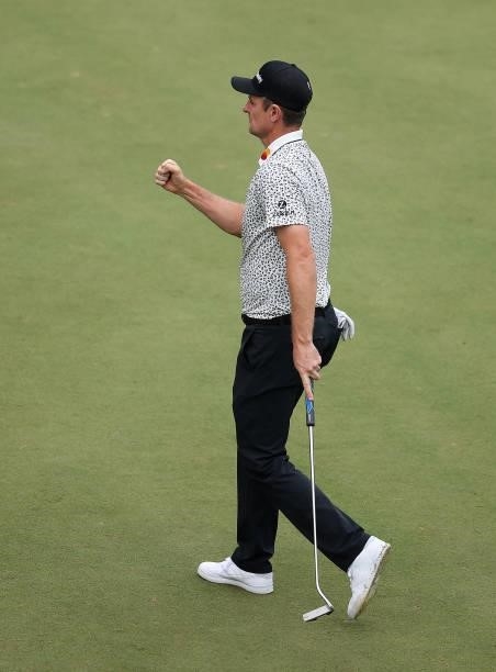 Justin Rose of England celebrates his putt on the 18th green during Day Two of The BMW PGA Championship at Wentworth Golf Club on September 10, 2021...