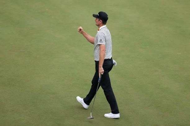 Justin Rose of England celebrates his putt on the 18th green during Day Two of The BMW PGA Championship at Wentworth Golf Club on September 10, 2021...