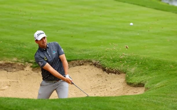Bernd Wiesberger of Austria plays his third shot on the 18th hole during the second round of The BMW PGA Championship at Wentworth Golf Club on...