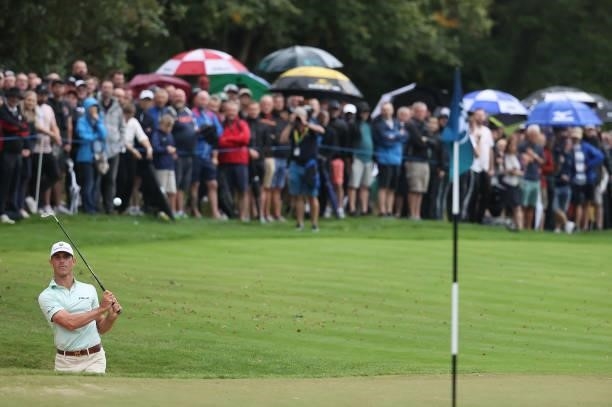 Billy Horschel of the United states of America plays out of a bunker on the 18th hole during Day Two of The BMW PGA Championship at Wentworth Golf...