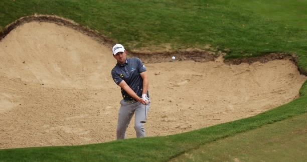 Bernd Wiesberger of Austria plays out of a bunker on the 18th hole during Day Two of The BMW PGA Championship at Wentworth Golf Club on September 10,...