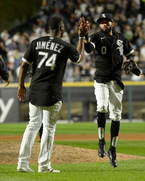Billy Hamilton and Eloy Jimenez of the Chicago White Sox celebrate after the game against the Boston Red Sox on September 10, 2021 at Guaranteed Rate...