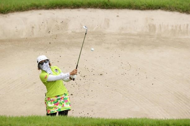 Satsuki Oshiro of Japan hits out from a bunker on the 5th hole during the third round of the JLPGA Championship Konica Minolta Cup at Shizu Hills...