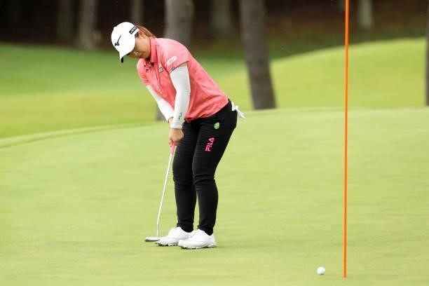 Mao Saigo of Japan holes the birdie putt on the 5th green during the third round of the JLPGA Championship Konica Minolta Cup at Shizu Hills Country...