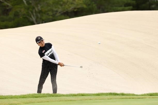 Sayaka Takahashi of Japan hits out from a bunker on the 11th hole during the third round of the JLPGA Championship Konica Minolta Cup at Shizu Hills...