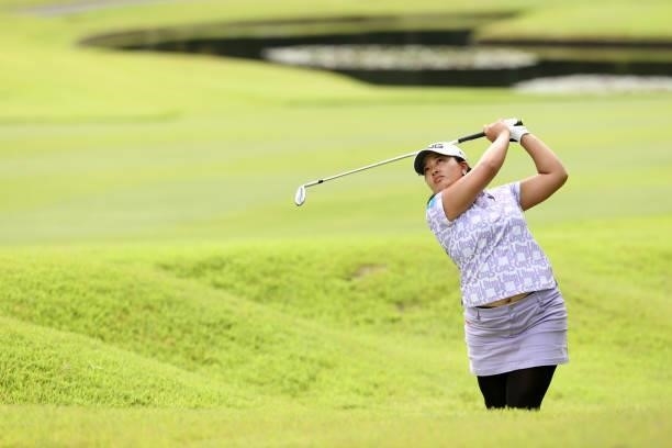 Ai Suzuki of Japan hits her second shot on the 16th hole during the third round of the JLPGA Championship Konica Minolta Cup at Shizu Hills Country...