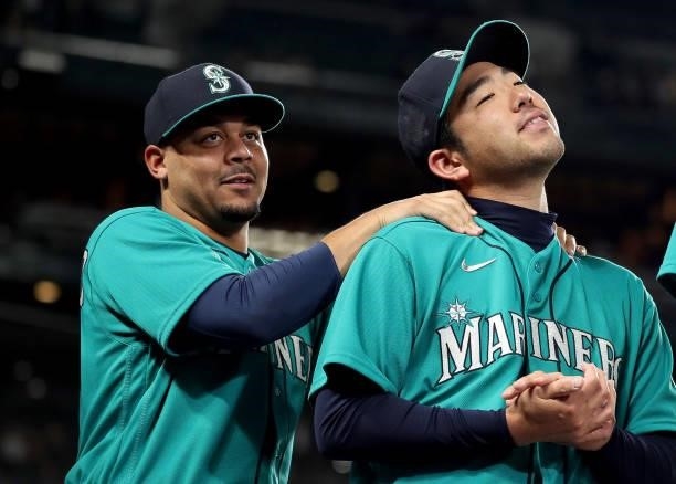 Justus Sheffield and Yusei Kikuchi of the Seattle Mariners look on before the game against the Arizona Diamondbacks at T-Mobile Park on September 10,...