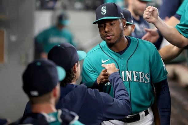 Kyle Lewis of the Seattle Mariners fist bumps Marco Gonzales before the game against the Arizona Diamondbacks at T-Mobile Park on September 10, 2021...
