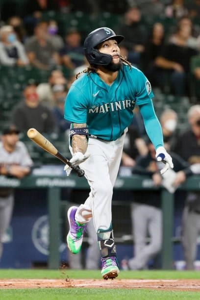 Crawford of the Seattle Mariners watches his home run against the Arizona Diamondbacks during the first inning at T-Mobile Park on September 10, 2021...