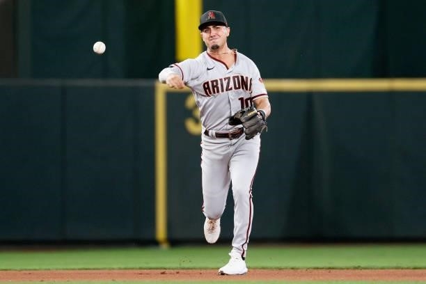 Josh Rojas of the Arizona Diamondbacks throws to first base against the Seattle Mariners at T-Mobile Park on September 10, 2021 in Seattle,...