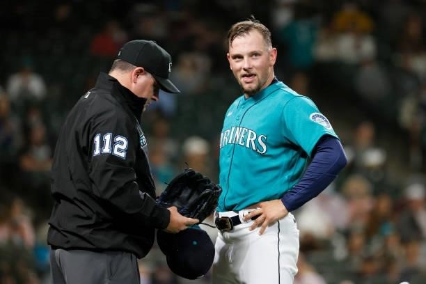 Anthony Misiewicz of the Seattle Mariners is checked for a foreign sticky substance during the game against the Arizona Diamondbacks at T-Mobile Park...
