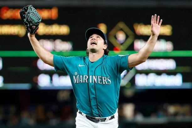 Marco Gonzales of the Seattle Mariners reacts to a pop fly against the Arizona Diamondbacks at T-Mobile Park on September 10, 2021 in Seattle,...