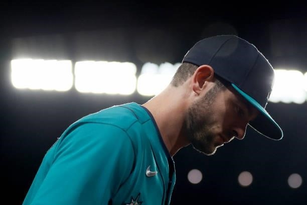 Mitch Haniger of the Seattle Mariners makes his way to the field against the Arizona Diamondbacks at T-Mobile Park on September 10, 2021 in Seattle,...