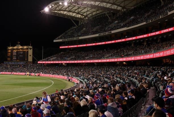 Fans watch on during the AFL Second Preliminary Final match between Port Adelaide Power and Western Bulldogs at Adelaide Oval on September 11, 2021...