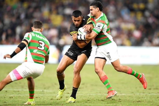 Stephen Crichton of the Panthers is tackled by Cody Walker of the Rabbitohs during the NRL Qualifying Final match between Penrith Panthers and South...