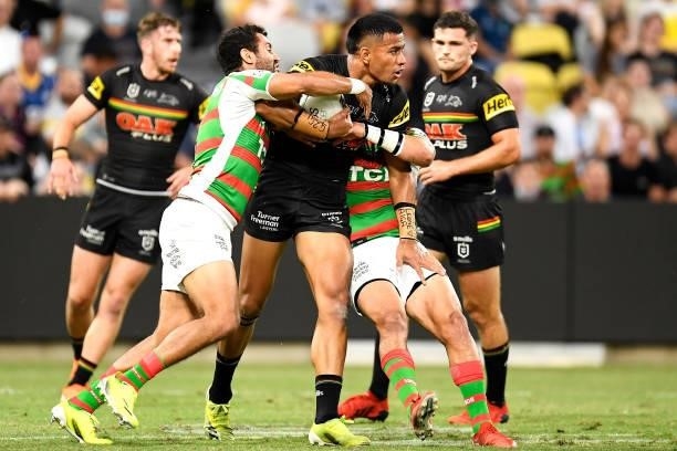 Stephen Crichton of the Panthers is tackled during the NRL Qualifying Final match between Penrith Panthers and South Sydney Rabbitohs at QCB Stadium,...