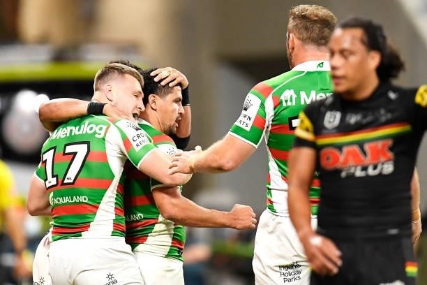 Cody Walker of the Rabbitohs celebrates with his team mates after scoring a try during the NRL Qualifying Final match between Penrith Panthers and...