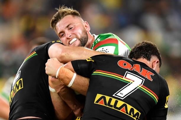 Jed Cartwright of the Rabbitohs is tackled during the NRL Qualifying Final match between Penrith Panthers and South Sydney Rabbitohs at QCB Stadium,...