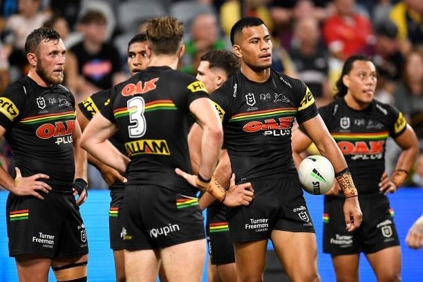 Kurt Capewell, Tevita Pangai Junior and Stephen Crichton of the Panthers look dejected during the NRL Qualifying Final match between Penrith Panthers...