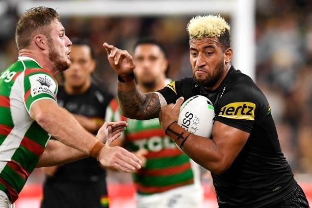 Thomas Burgess of the Rabbitohs tackles Viliame Kikau of the Panthers during the NRL Qualifying Final match between Penrith Panthers and South Sydney...