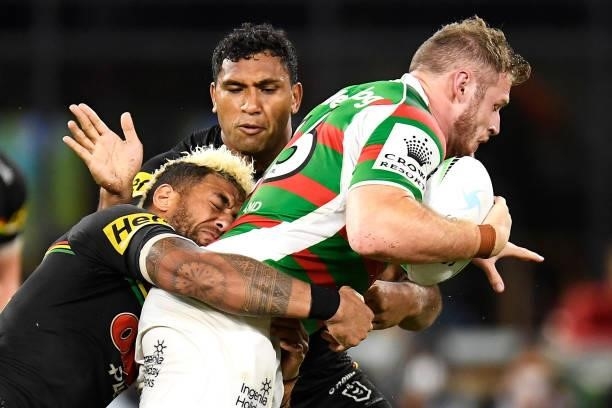 Viliame Kikau of the Panthers tackles Thomas Burgess of the Rabbitohs during the NRL Qualifying Final match between Penrith Panthers and South Sydney...