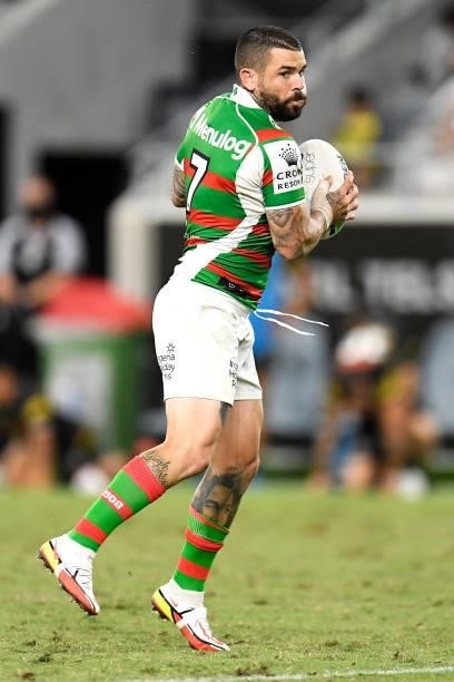 Adam Reynolds of the Rabbitohs runs the ball during the NRL Qualifying Final match between Penrith Panthers and South Sydney Rabbitohs at QCB...