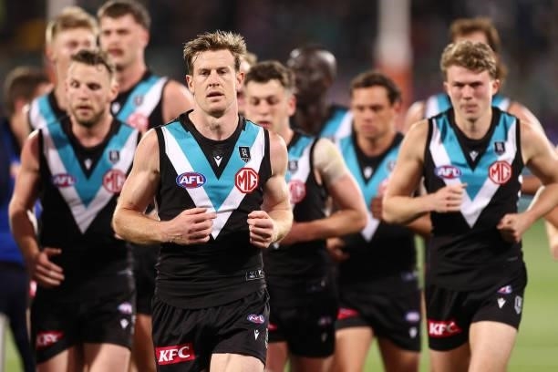 Tom Jonas and his Power team mates run off the field during the AFL Second Preliminary Final match between Port Adelaide Power and Western Bulldogs...