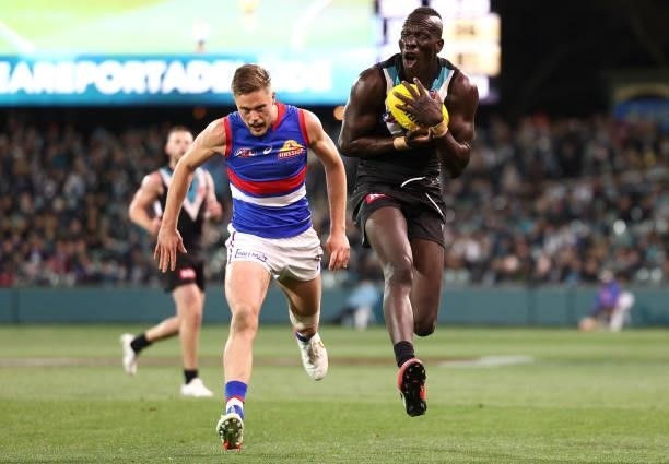 Aliir Aliir of the Power marks during the AFL Second Preliminary Final match between Port Adelaide Power and Western Bulldogs at Adelaide Oval on...
