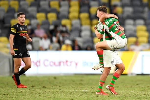 Blake Taaffe and Cody Walker of the Rabbitohs celebrate victory during the NRL Qualifying Final match between Penrith Panthers and South Sydney...