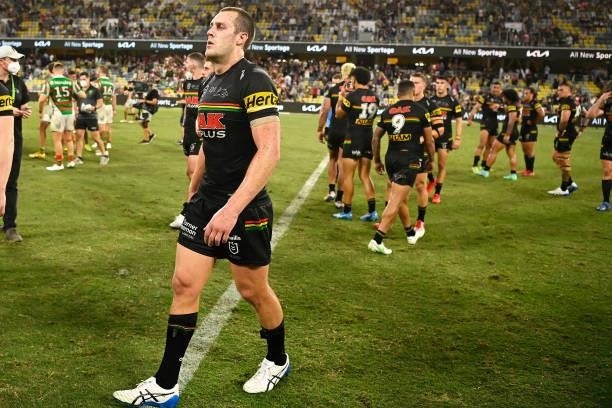 Isaah Yeo of the Panthers and the Panthers team look dejected as they leave the field after defeat during the NRL Qualifying Final match between...