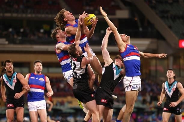 Aaron Naughton of the Bulldogs flies for a mark during the AFL Second Preliminary Final match between Port Adelaide Power and Western Bulldogs at...