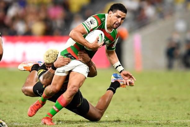 Cody Walker of the Rabbitohs is tackled by Viliame Kikau of the Panthers during the NRL Qualifying Final match between Penrith Panthers and South...