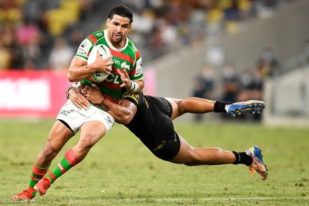 Cody Walker of the Rabbitohs is tackled by Viliame Kikau of the Panthers during the NRL Qualifying Final match between Penrith Panthers and South...
