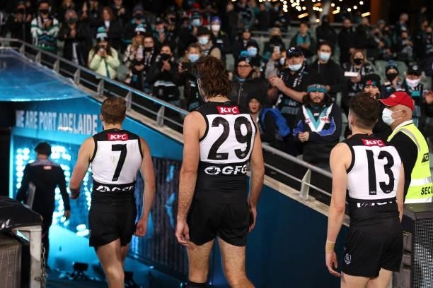 The Power look dejected as they walk off the field during the AFL Second Preliminary Final match between Port Adelaide Power and Western Bulldogs at...