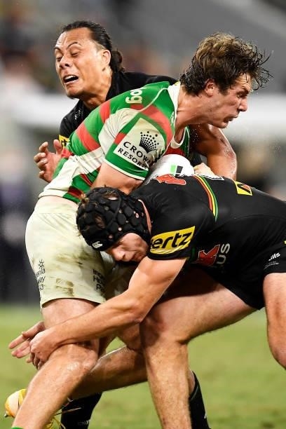 Campbell Graham of the Rabbitohs is tackled by Jerome Luai and Matt Burton of the Panthers during the NRL Qualifying Final match between Penrith...