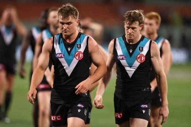 Ollie Wines and Tom Jonas of the Power look dejected after losing the AFL Second Preliminary Final match between Port Adelaide Power and Western...