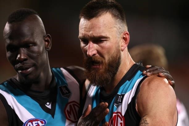 Aliir Aliir and Charlie Dixon of the Power look dejected after losing the AFL Second Preliminary Final match between Port Adelaide Power and Western...