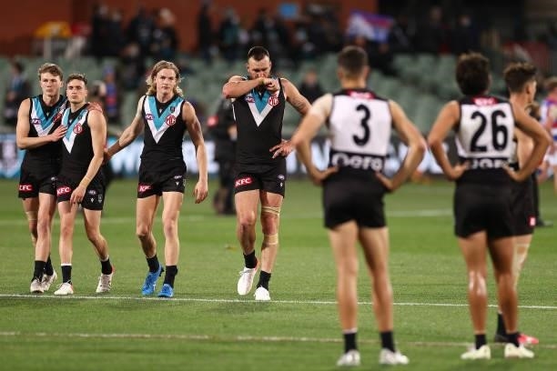 The Power look dejected after losing the AFL Second Preliminary Final match between Port Adelaide Power and Western Bulldogs at Adelaide Oval on...