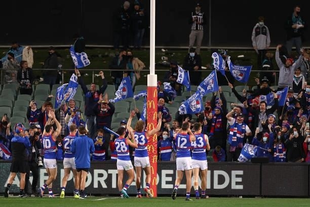 The Bulldogs celebrate with fans after winning the AFL Second Preliminary Final match between Port Adelaide Power and Western Bulldogs at Adelaide...