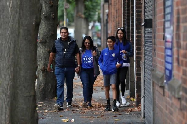 Fans of Leicester City make their way towards the stadium prior to the Premier League match between Leicester City and Manchester City at The King...