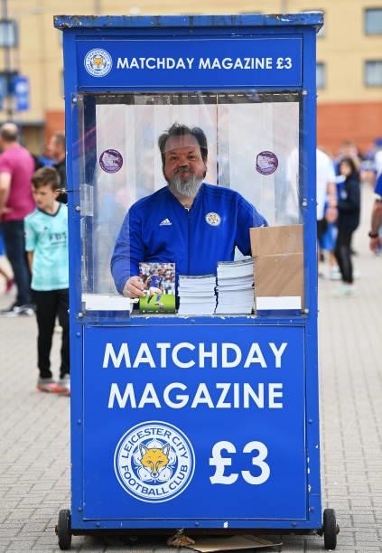 Matchday programme seller is seen outside the stadium prior to the Premier League match between Leicester City and Manchester City at The King Power...