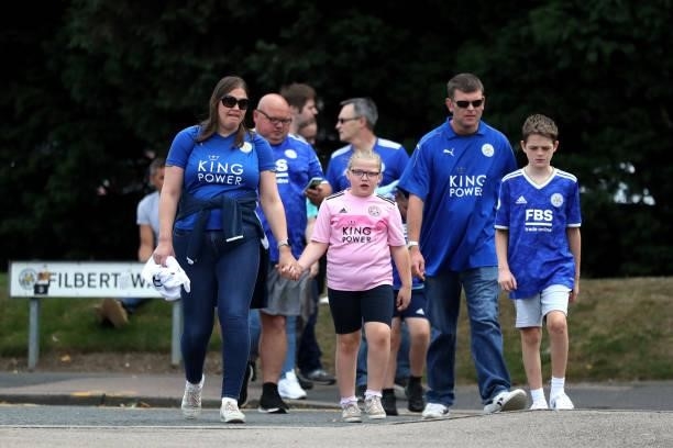 Fans of Leicester City make their way towards the stadium prior to the Premier League match between Leicester City and Manchester City at The King...