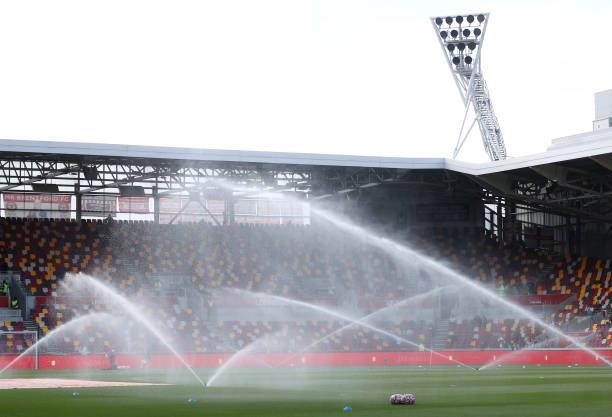 General view inside the stadium as the pitch is watered prior to the Premier League match between Brentford and Brighton & Hove Albion at Brentford...