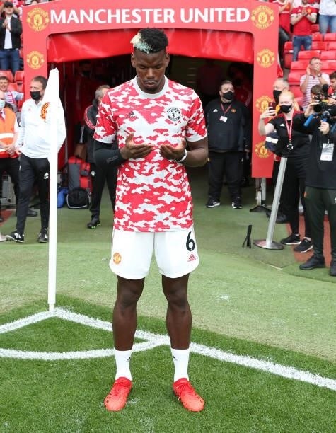 Paul Pogba of Manchester United warms up ahead of the Premier League match between Manchester United and Newcastle United at Old Trafford on...