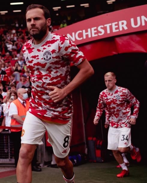 Juan Mata of Manchester United warms up ahead of the Premier League match between Manchester United and Newcastle United at Old Trafford on September...