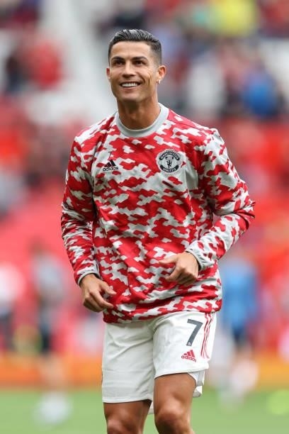 Cristiano Ronaldo of Manchester United smiles as he warms up prior to the Premier League match between Manchester United and Newcastle United at Old...
