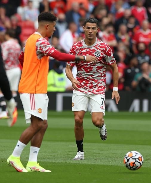 Cristiano Ronaldo and Jadon Sancho of Manchester United warms up ahead of the Premier League match between Manchester United and Newcastle United at...